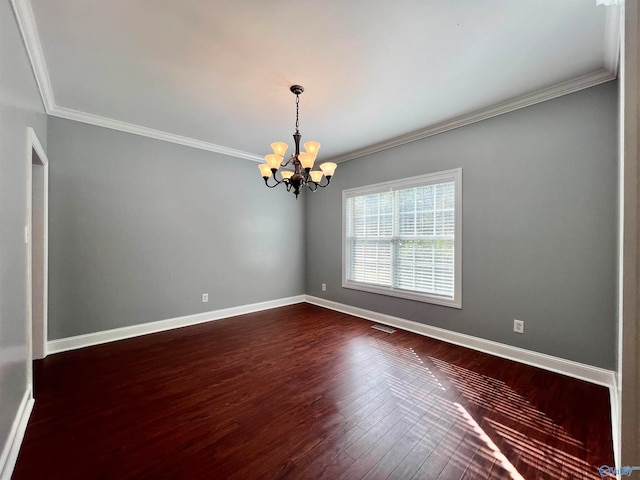 unfurnished room with ornamental molding, a chandelier, and dark hardwood / wood-style floors