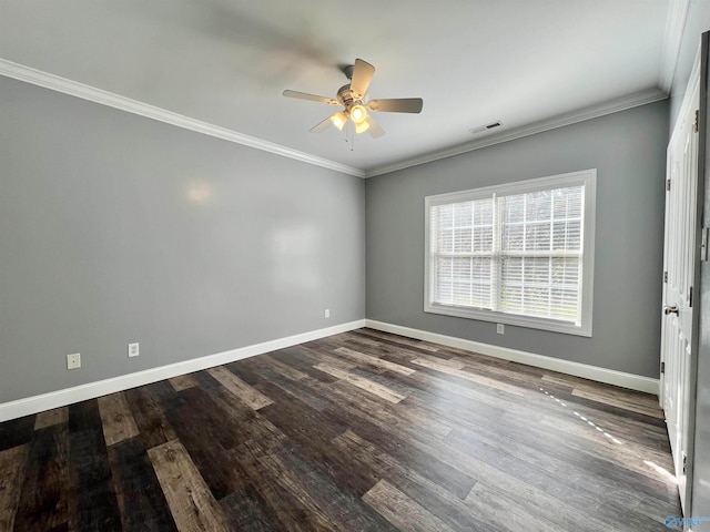 empty room featuring dark hardwood / wood-style flooring, ceiling fan, and crown molding