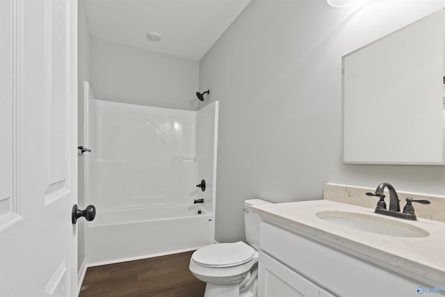 full bathroom featuring vanity, toilet, shower / bathtub combination, and hardwood / wood-style floors