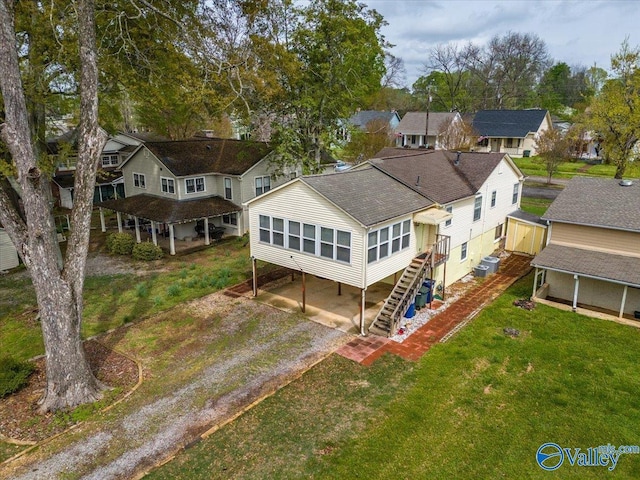 drone / aerial view with a residential view