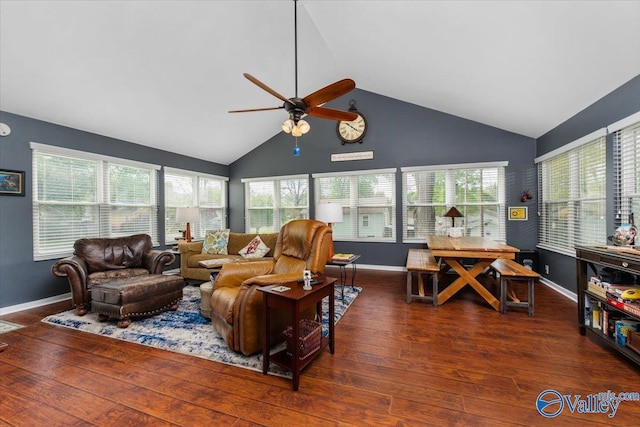 living room featuring baseboards, ceiling fan, vaulted ceiling, and hardwood / wood-style flooring