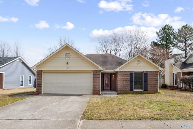 ranch-style home featuring a front yard, brick siding, an attached garage, and driveway