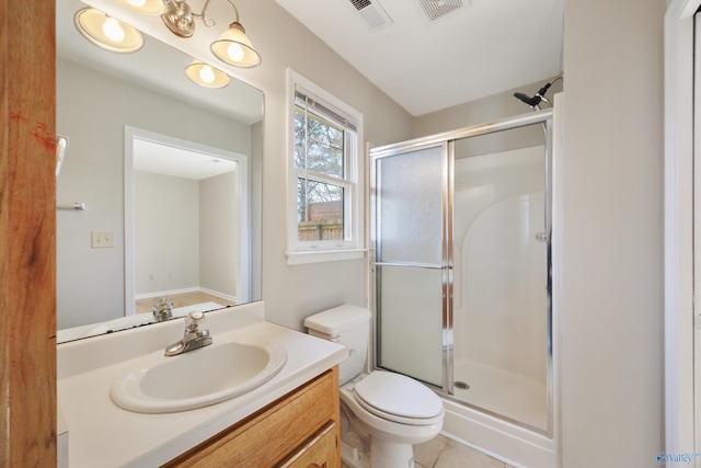 full bath with vanity, toilet, visible vents, and a stall shower