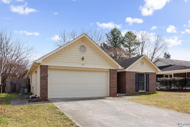 ranch-style house with cooling unit, fence, driveway, a garage, and brick siding