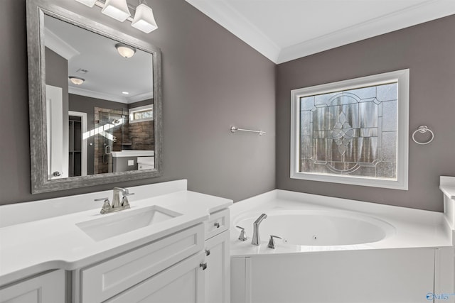 bathroom with crown molding, a tub to relax in, and vanity