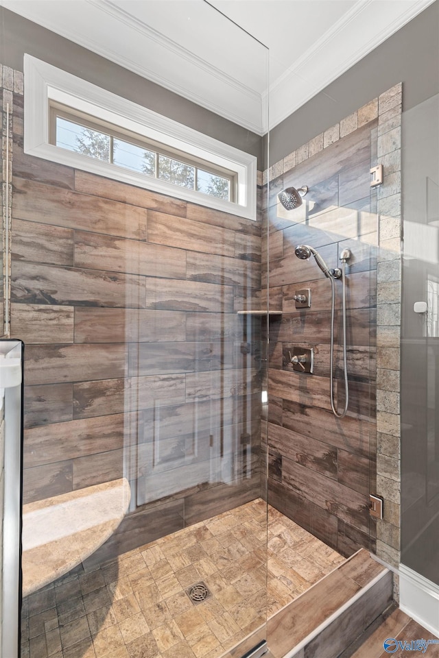 bathroom featuring wood-type flooring, a shower with door, and crown molding