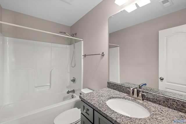 full bathroom featuring toilet, shower / washtub combination, and vanity