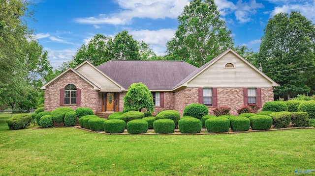 2211 Pumpkin Center Rd NE, Fort Payne, AL 35967 - ranch-style house with brick siding and a front yard