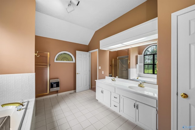 2211 Pumpkin Center Rd NE, Fort Payne, AL 35967 - bathroom featuring heating unit, a garden tub, a shower stall, double vanity, and lofted ceiling