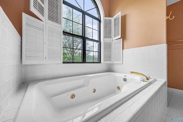 2211 Pumpkin Center Rd NE, Fort Payne, AL 35967 - bathroom featuring a whirlpool tub and tile patterned flooring