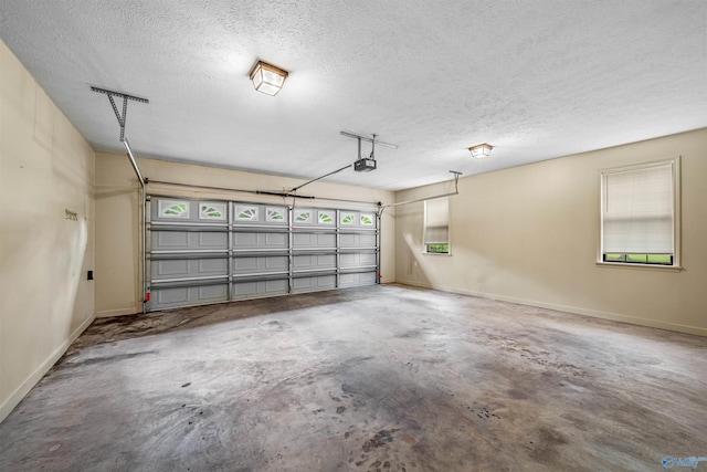 2211 Pumpkin Center Rd NE, Fort Payne, AL 35967 - garage with a garage door opener and baseboards