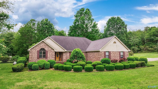 2211 Pumpkin Center Rd NE, Fort Payne, AL 35967 - ranch-style home with brick siding, a front lawn, and a shingled roof