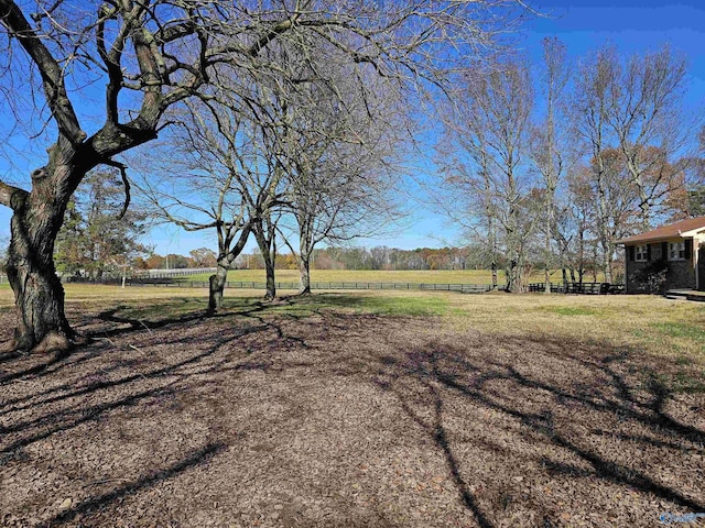 view of yard featuring a rural view