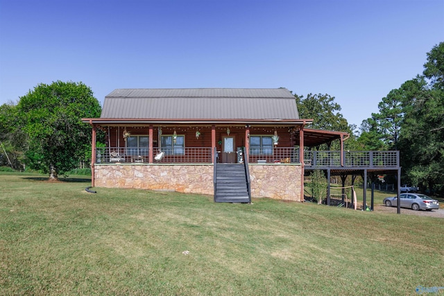 view of front of house featuring a porch, a front lawn, and a carport