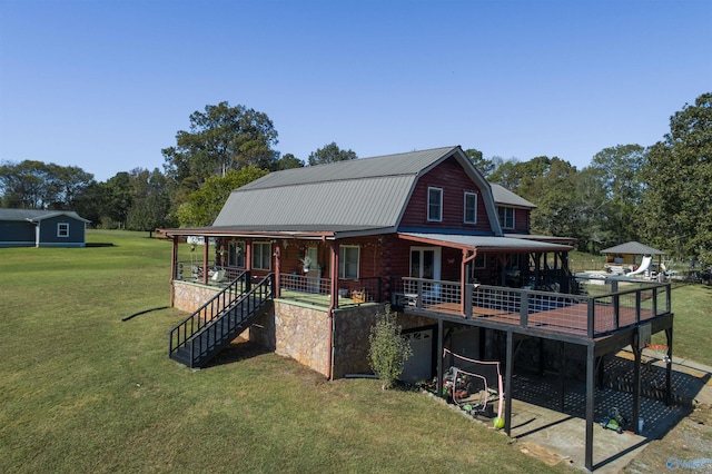 exterior space featuring a yard and covered porch