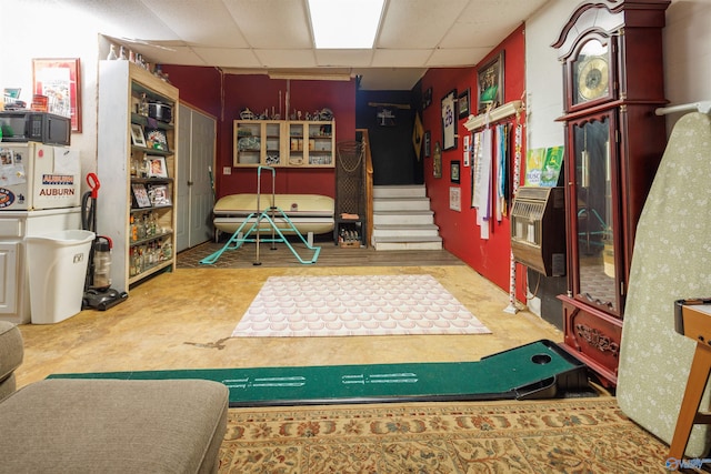 miscellaneous room featuring a paneled ceiling