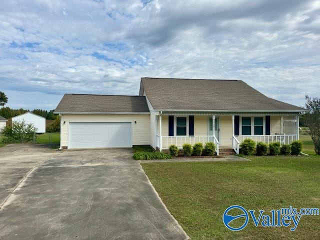 single story home featuring a garage, a front lawn, and covered porch