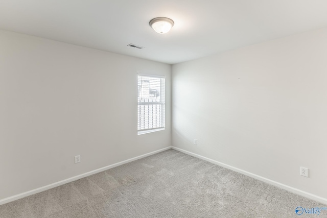 view of carpeted spare room