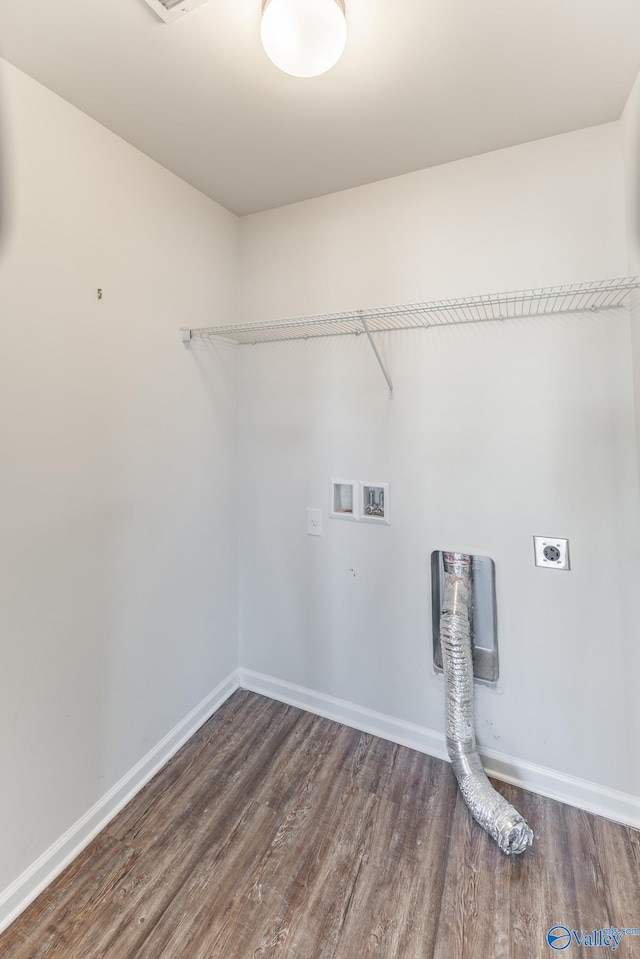 washroom featuring hookup for an electric dryer, wood-type flooring, and washer hookup