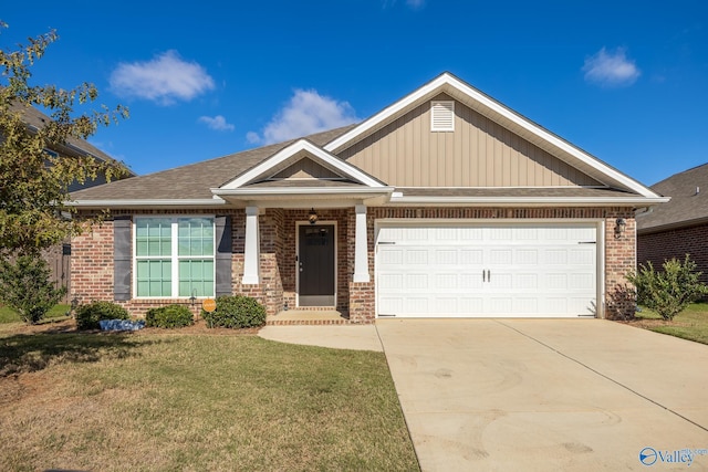 craftsman-style home featuring a front yard and a garage