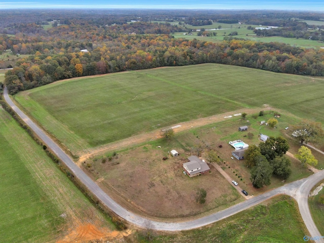 birds eye view of property featuring a rural view