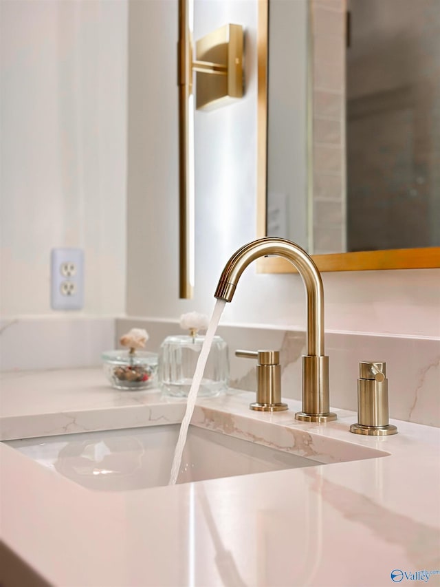 interior details featuring a sink