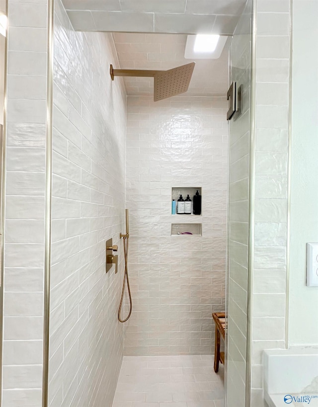 full bathroom with tiled shower