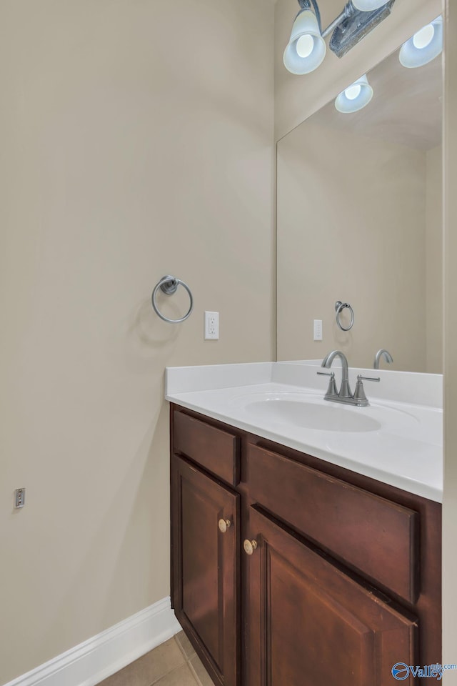 bathroom featuring tile patterned floors and vanity