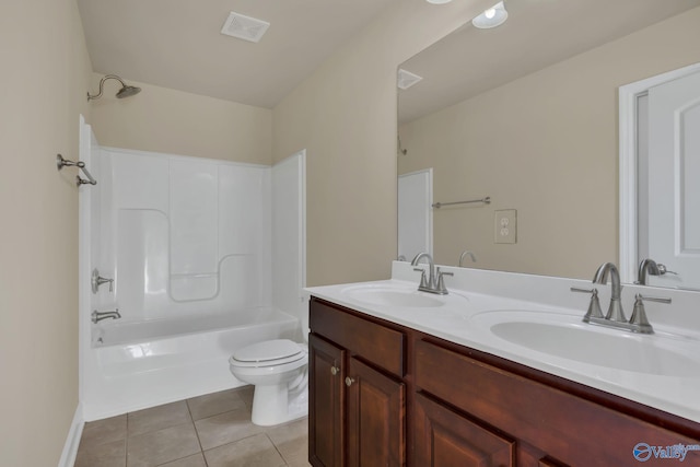 full bathroom featuring vanity, shower / bath combination, tile patterned flooring, and toilet