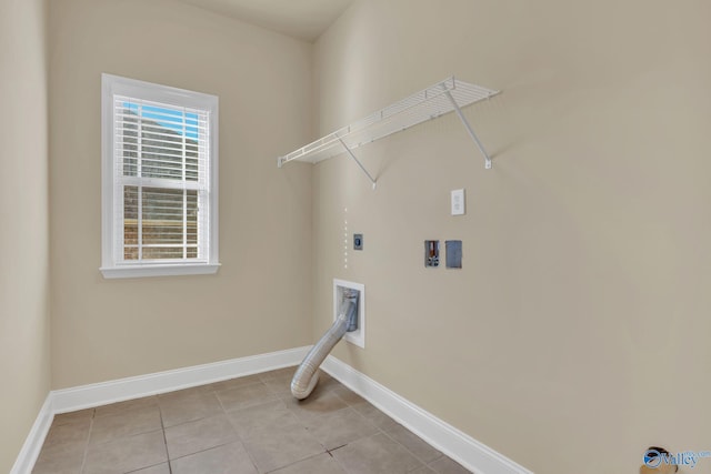 laundry room with washer hookup, light tile patterned floors, and hookup for an electric dryer