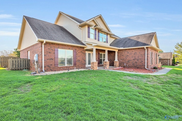 view of front of home featuring a patio area and a front lawn