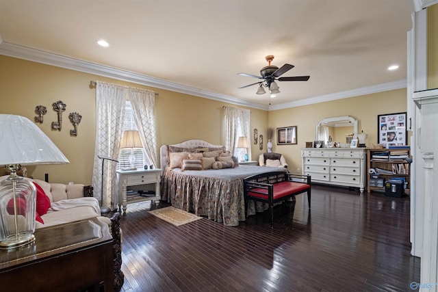 bedroom featuring dark wood-type flooring, ceiling fan, and ornamental molding