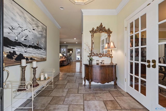 entryway with french doors and ornamental molding