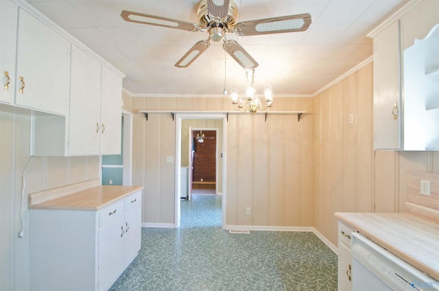 kitchen with white dishwasher, ceiling fan with notable chandelier, white cabinetry, light countertops, and light floors