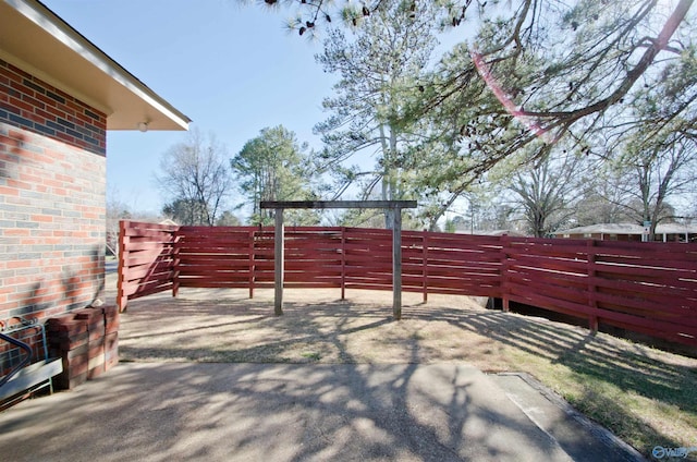 view of patio with fence