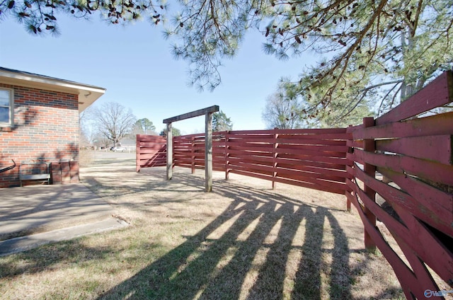 view of yard featuring fence