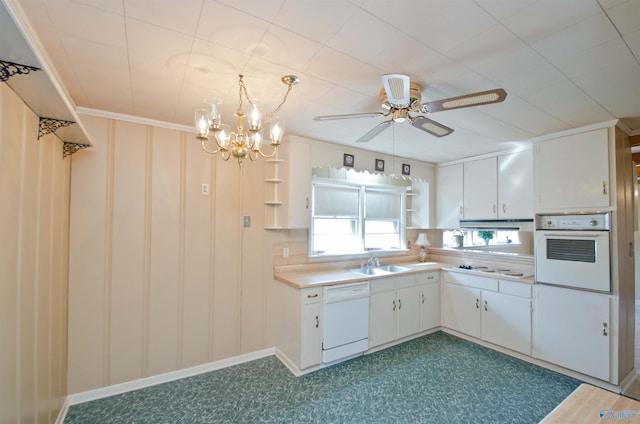 kitchen featuring open shelves, light countertops, white cabinetry, a sink, and white appliances