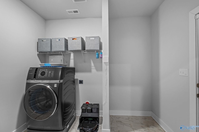 laundry area featuring washer / clothes dryer