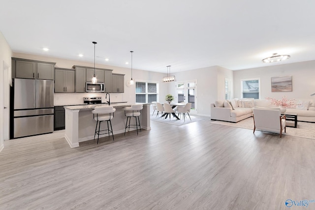 103 Barlow Way, Owens Cross Roads, AL 35763 - living room with light wood-type flooring and recessed lighting