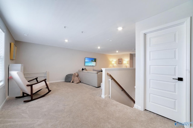 103 Barlow Way, Owens Cross Roads, AL 35763 - living area featuring an upstairs landing, carpet flooring, and recessed lighting