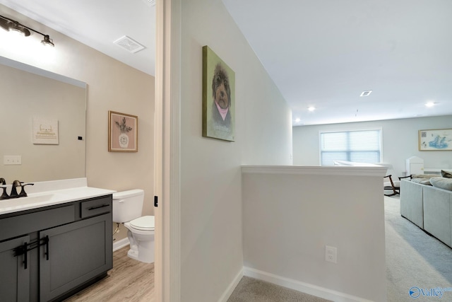 103 Barlow Way, Owens Cross Roads, AL 35763 - bathroom with vanity and wood finished floors