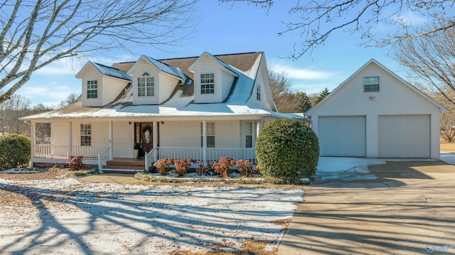 view of front of property with a porch and a garage