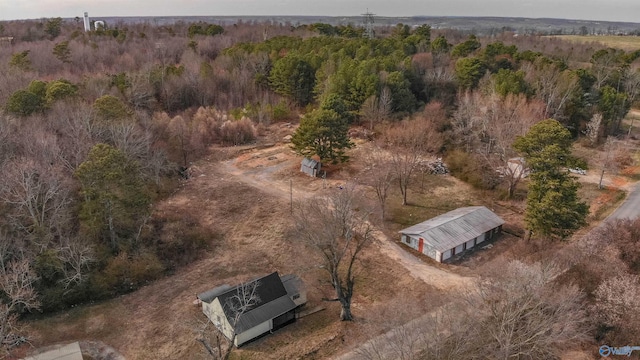 bird's eye view featuring a forest view