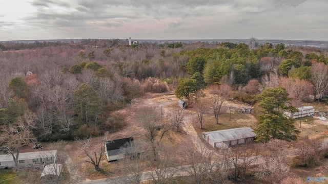 bird's eye view featuring a view of trees