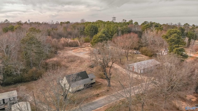 bird's eye view featuring a forest view