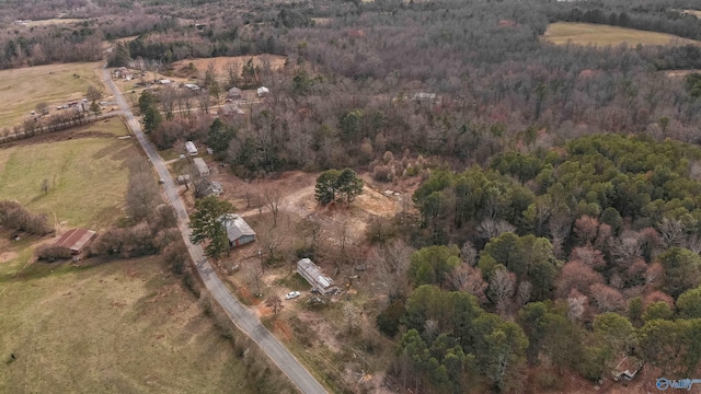 aerial view with a view of trees and a rural view
