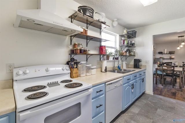 kitchen with under cabinet range hood, blue cabinetry, white appliances, and open shelves