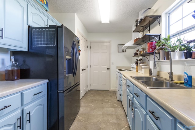 kitchen featuring open shelves, a sink, black fridge with ice dispenser, blue cabinets, and white range with electric stovetop