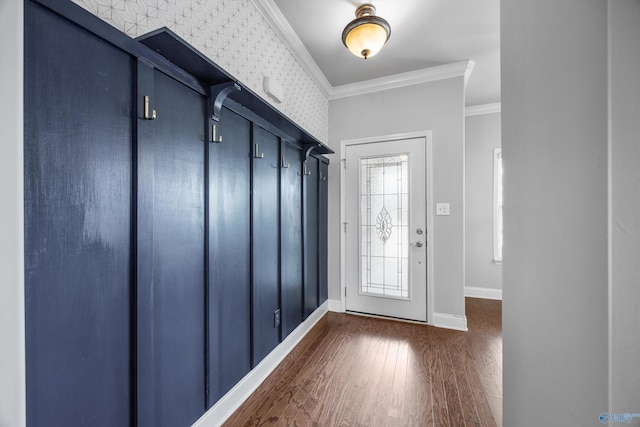 mudroom with baseboards, dark wood-type flooring, and crown molding