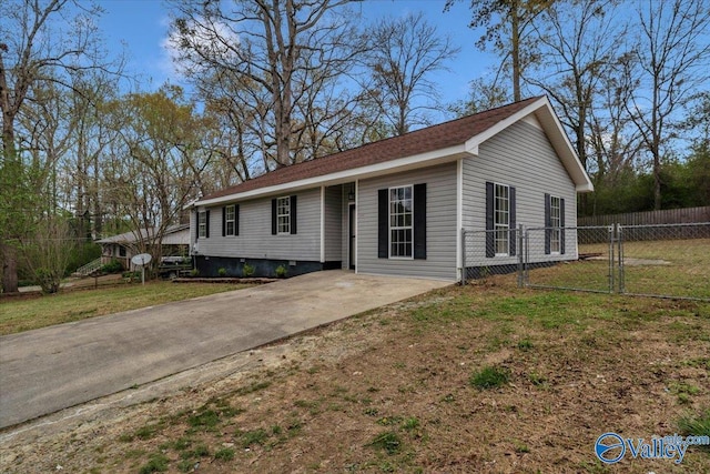 ranch-style house with a front yard, a gate, and fence